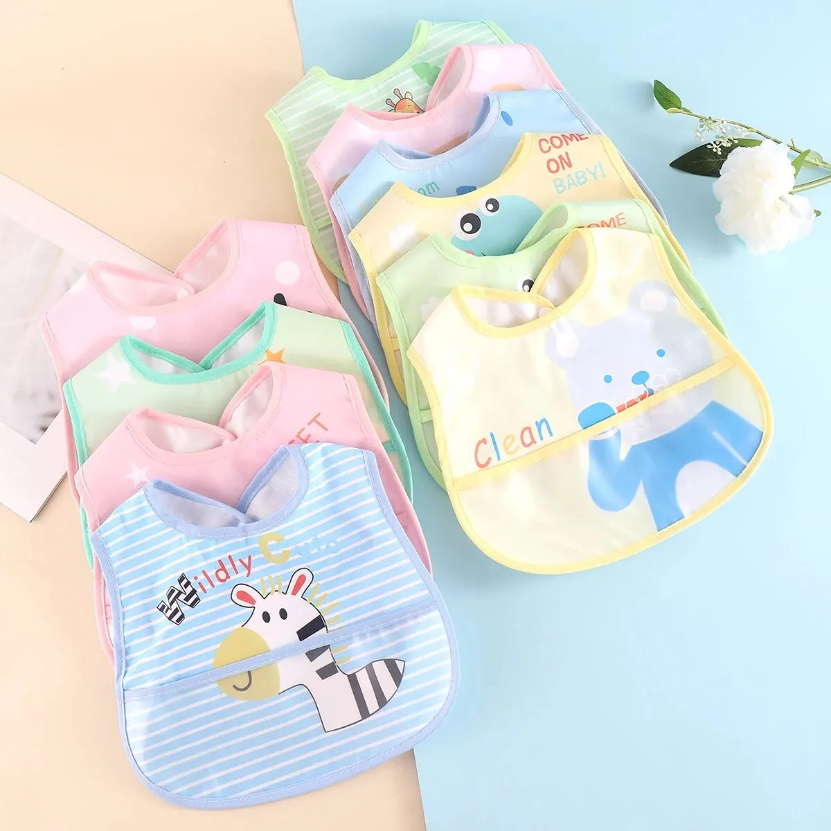 Waterproof Cartoon Bibs Set (5 Pieces)